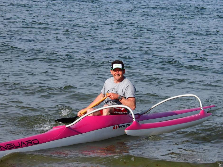 John Galilee pink OC1 paddling