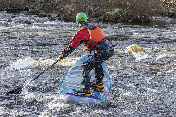 Demonstrating body position to edge without swapping sides. Paddler James. Photo: Eleri Spencer