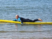 Prone paddling by Tez Plavenieks