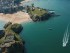 Aerial view of Tenby with sandy beaches and Tenby Castle on the Pembrokeshire coastline on the west side of Carmarthen Bay. Photo: VisitBritain/Jason Hawkes